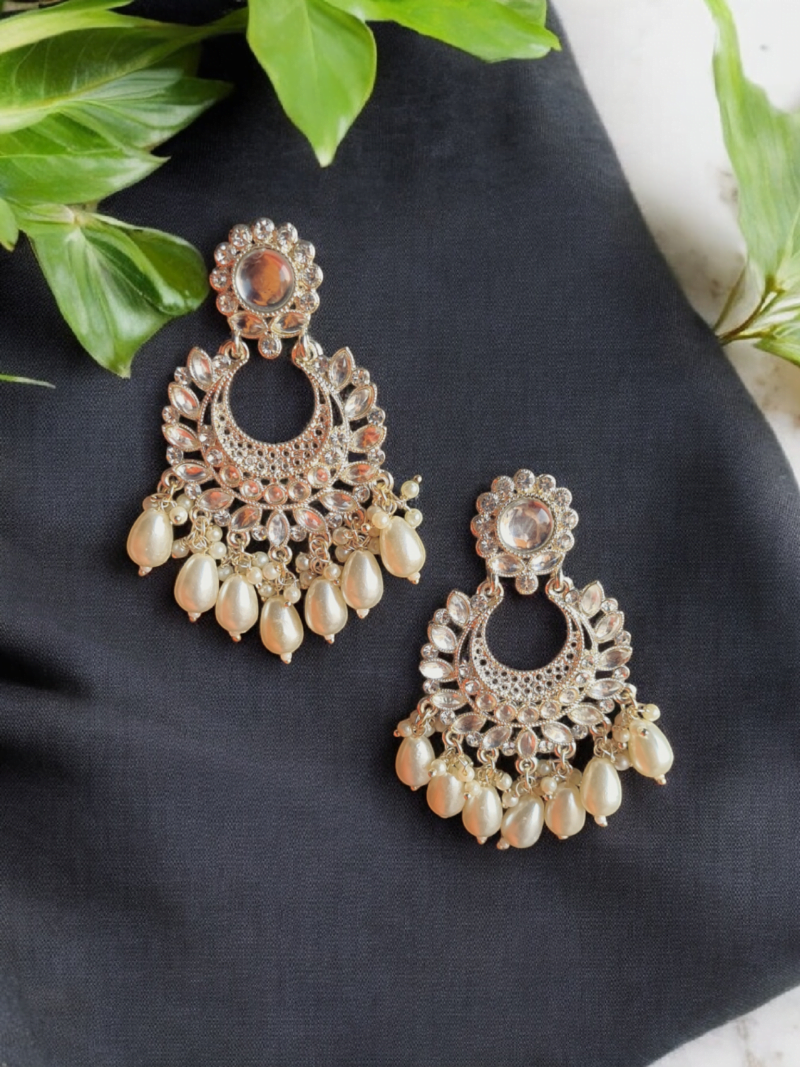 Statement Kundan and Polki earrings with Pearl Danglers.